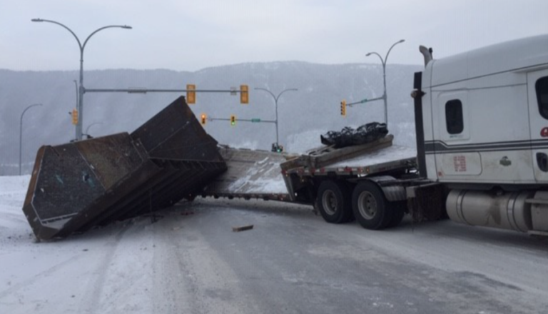 Semi trailer tipped at highway intersection in Sparwood