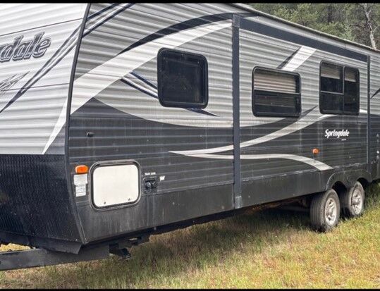 Pictured stolen Springdale travel trailer Alberta Plate 5JF973