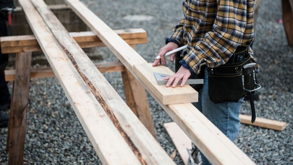 Carpenter working with lumber
